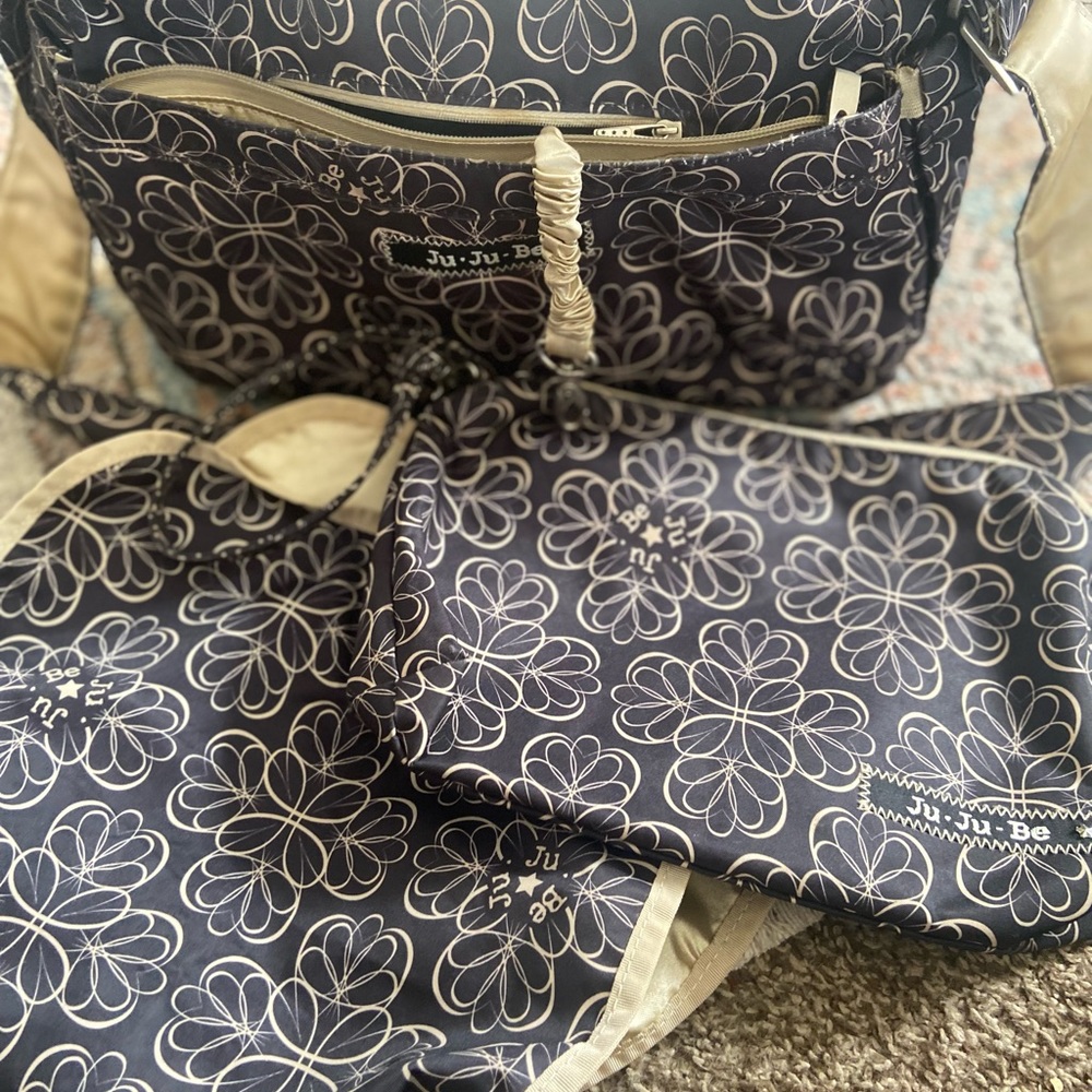 We are over the diaper bag phase!